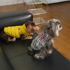 Reversible winter puffer vest for small to medium dogs in yellow and zebra print.