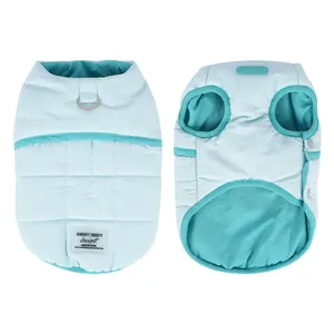 Warm light blue quilted winter dog vest featuring a leash D-ring for medium dogs