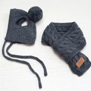 Dark gray knitted pet hat and scarf set with pom-pom and cable pattern
