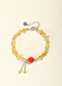 Bracciale artigianale in citrino irregolare con perla di agata rossa e catena argento.