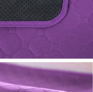 Close-up detail of purple breathable quilted pet mat showing non-slip dots and stitching