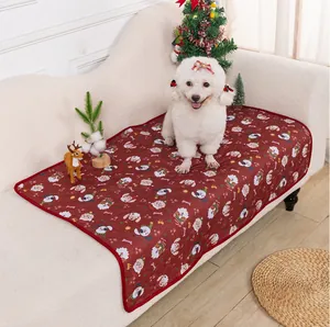 Detailed view of a red Christmas pet mat with cute dog print, cozy sofa blanket for dogs cats.