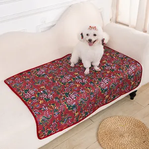 Detail view of red floral pet sofa mat blanket, washable non-slip protector for cats and dogs.