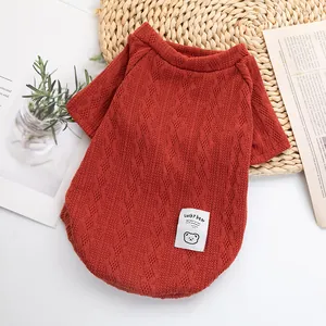Burnt orange knitted pet sweater with warm cable pattern for small dogs and cats