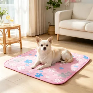 Comfortable pink pet ice silk cooling mat with paw prints for dogs and cats in living room