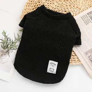 Cozy and warm black knitted pet sweater for dogs and cats featuring a cute bear patch