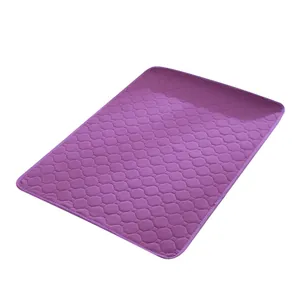 Purple washable absorbent pet mat with hexagonal quilted pattern for puppies