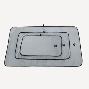Set of 3 absorbent gray pet towels in different sizes with cute paw prints