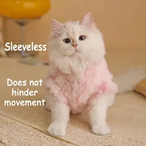 Detail view of the pink plush sleeveless cat vest showing its soft fuzzy texture and cute design