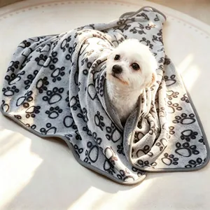 Thickened flannel pet blanket with grey paw print pattern for dogs and cats
