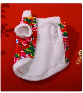 Detailed view of festive floral pet vest with warm white fleece lining and snap buttons