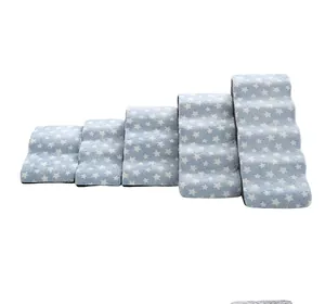 Detail side view of 5-step soft fleece pet stairs in blue featuring white star patterns