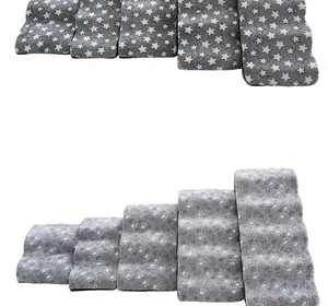 Detail view showing five-step dog stairs for small pets in star and paw patterns.