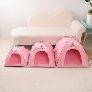 Three sizes of pink portable pet tents for dogs and cats in a cozy home setting.