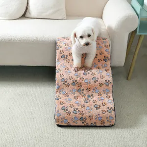 Portable plush pet stairs for small dogs with blue paw print patterns for sofa and bed use