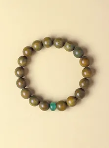Natural green sandalwood bead bracelet with green aventurine stone accent in retro style
