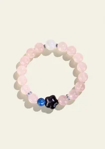 Pulsera de cuentas de cuarzo rosa natural con obsidiana en forma de estrella y detalles