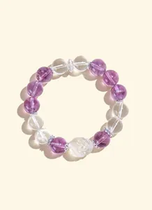 Pulsera de cuentas de cristal púrpura con detalle de dije de tortuga dragón tallada
