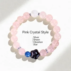 Pulsera de cuentas de cuarzo rosa natural con un dije de estrella de obsidiana