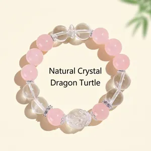 Pulsera de cuentas de cuarzo rosa y claro con dije de tortuga dragón tallada