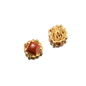 Detail view of 925 sterling silver gold-plated pendant with South Red Agate inlay.