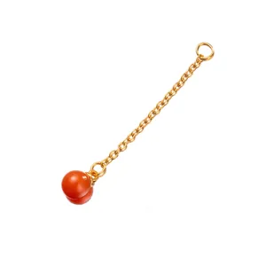 Detail view of 925 sterling silver gold plated chain with red agate bead for DIY jewelry