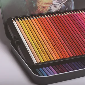 Macro view of 72 professional colored pencils organized in a premium metal tin box