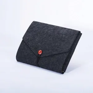 Premium charcoal grey felt colored pencil storage wrap with a stylish red button closure