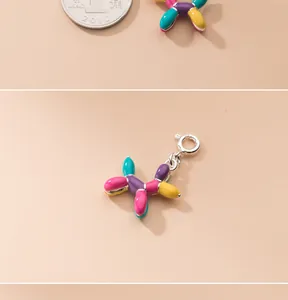Detail shot of a colorful S925 silver enamel balloon dog pendant with clasp closure.