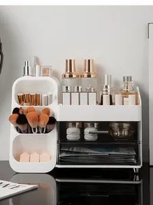 Large white cosmetic organizer for vanity holding skincare bottles and makeup brushes.