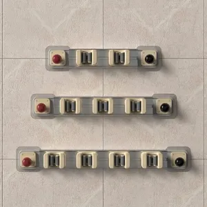 Self-adhesive wall-mounted mop and broom holder with adjustable sliding hooks for home