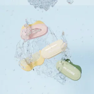 Mini portable folding hair combs in pastel colors with water splash effect