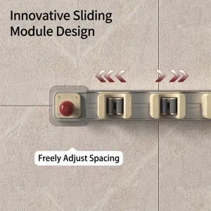 Self-adhesive sliding mop and broom holder with adjustable clips on a wall track