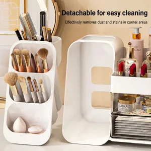 Large capacity white makeup organizer for brushes and lipsticks on dressing table.