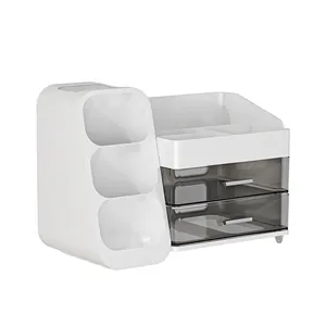 White desktop cosmetic organizer with three brush slots and two grey drawers for vanity.