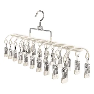 Multi-clip laundry drying rack with 12 non-slip steel pegs for socks and underwear.