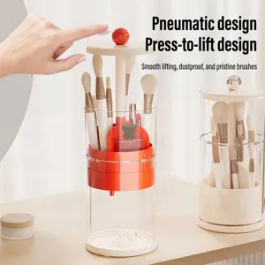 Cream style automatic lifting makeup brush organizer with dustproof clear lid for vanity