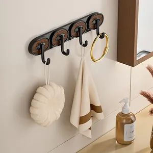 Modern black and wood wall hook rack for towels and accessories in bathroom scenery