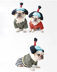 Detailed view of French Bulldogs wearing traditional Japanese samurai pet costumes