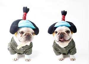 Detailed view of a small dog wearing a creative Japanese samurai kimono pet costume.