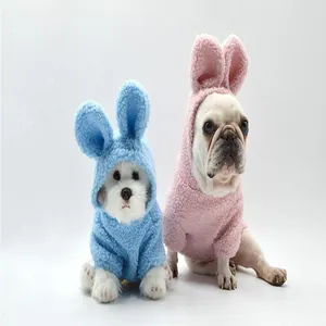 Close-up of cute pink and blue bunny ear dog hoodies in soft sherpa fleece material
