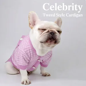 Elegant pink tweed pet knitted sweater vest worn by a small white French Bulldog