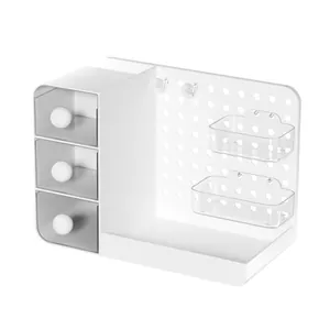 White desktop pegboard organizer with drawers and clear storage bins for vanity desk storage