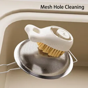 Multifunctional press-to-dispense cleaning brush with soft bristles for kitchen mesh sinks