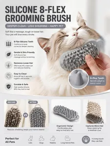 Detail of 8-flex silicone grooming brush removing loose hair from a long-haired cat