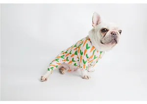 Adorable carrot pattern pet pajamas for dogs shown on a French Bulldog in studio.