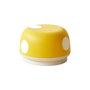 Creative mushroom-shaped low stool with cute yellow and white polka dots for home