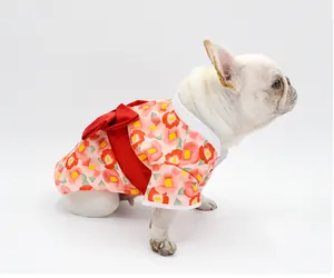 Elegant pet dog kimono with pink floral pattern and large red bow for small dogs
