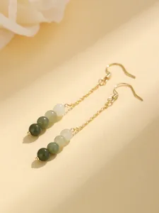 Elegant retro gold long dangle earrings featuring gradient green and white jade beads