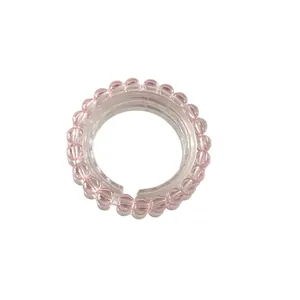 Niche design pink beaded bracelet with transparent round beads on white background